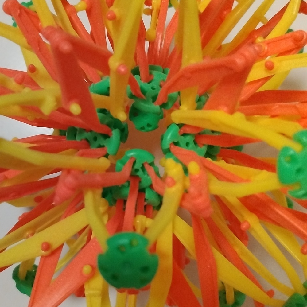 Hoberman Mini Sphere Expanding Breathing Ball Fidget Toy, Neon Pink Yellow Green - Picture 7 of 9